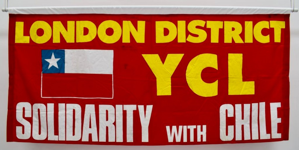 Red banner with Chilean flag. Text in yellow: London district YCL. Text in white: Solidarity with Chile.